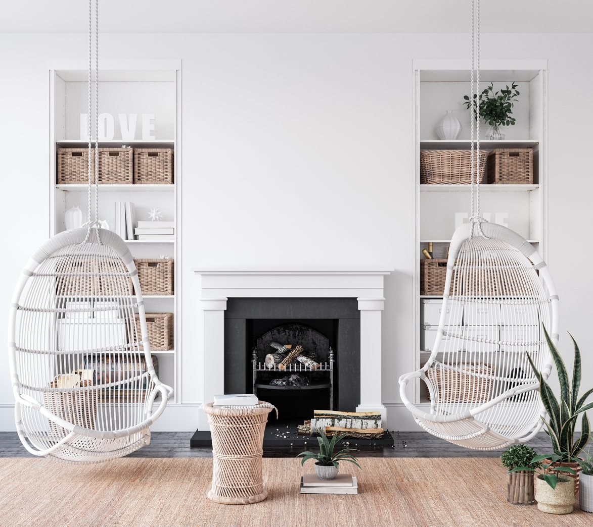 White living room with fireplace and built-in shelving